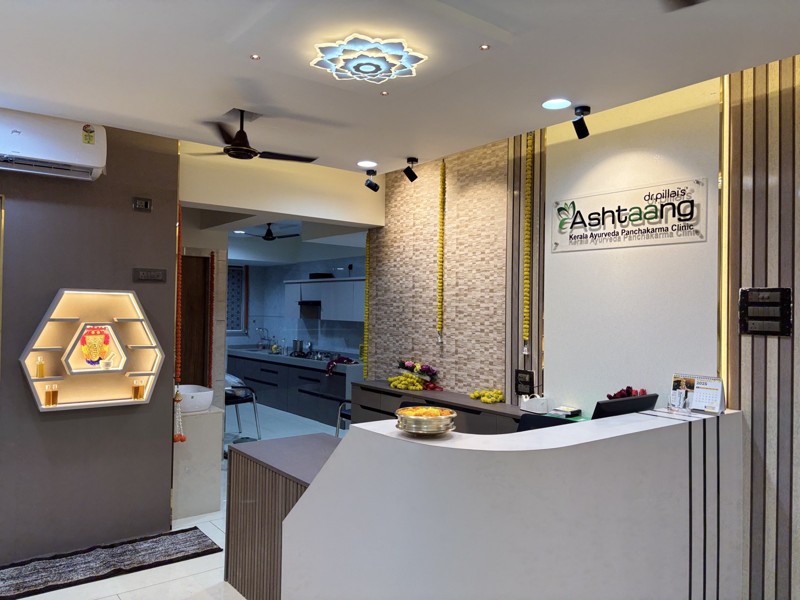 Reception desk and Ashtaang signage at the Ambernath clinic